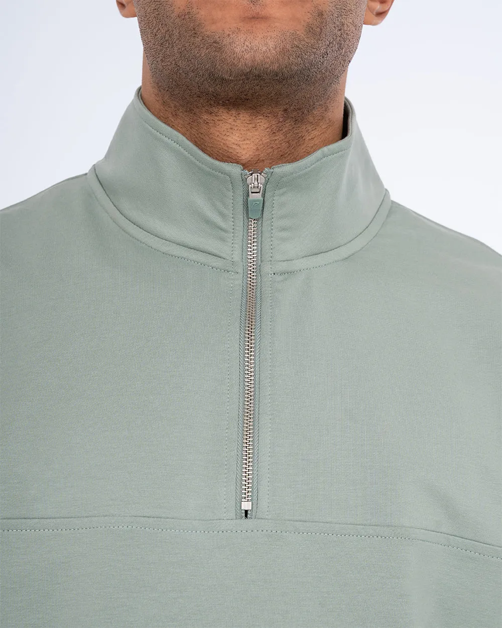 Parell Forge Tall Quarter Zip Training Top (sage) in-flight wear