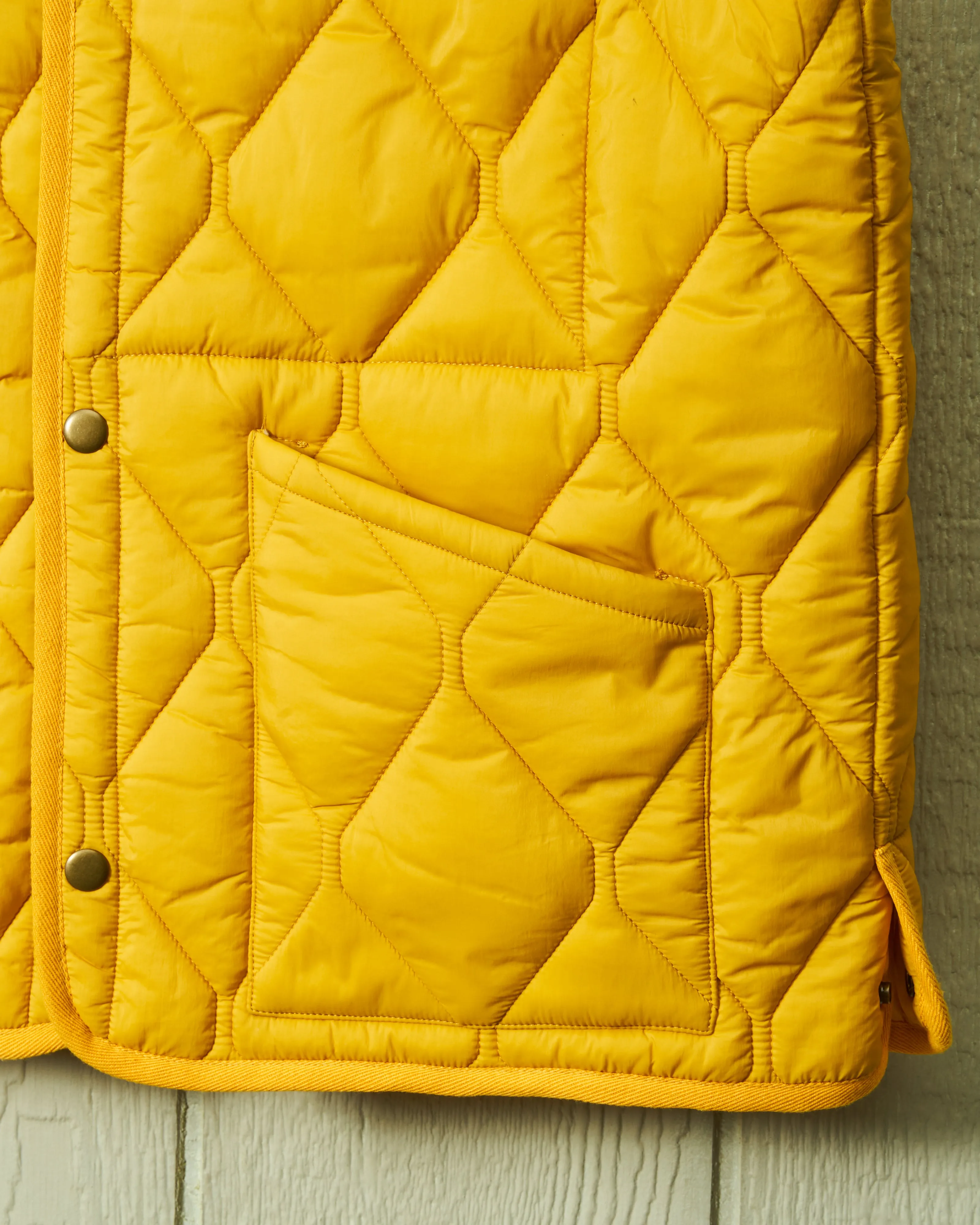 Quilted Vest in Yellow bold silhouette outer