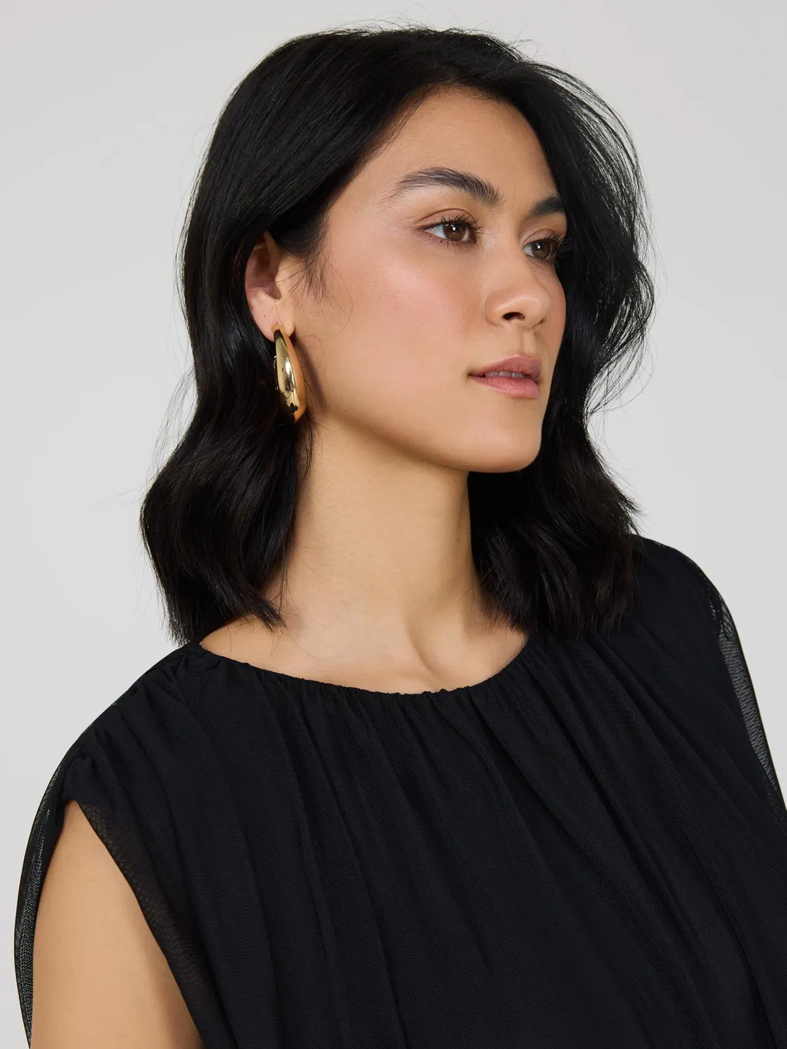 Sleeveless Bubble Hem Top throw on