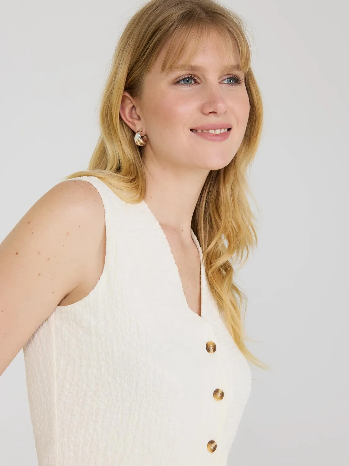 Textured Button-Up Vest on the move